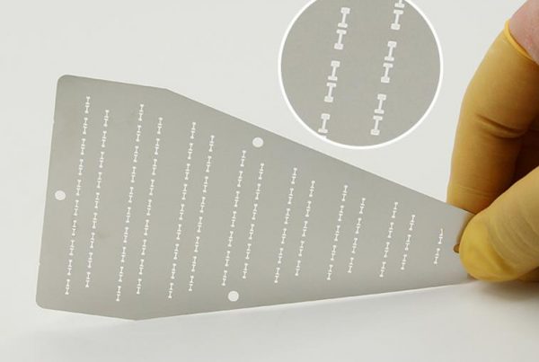 Stainless steel optical mask crystal element